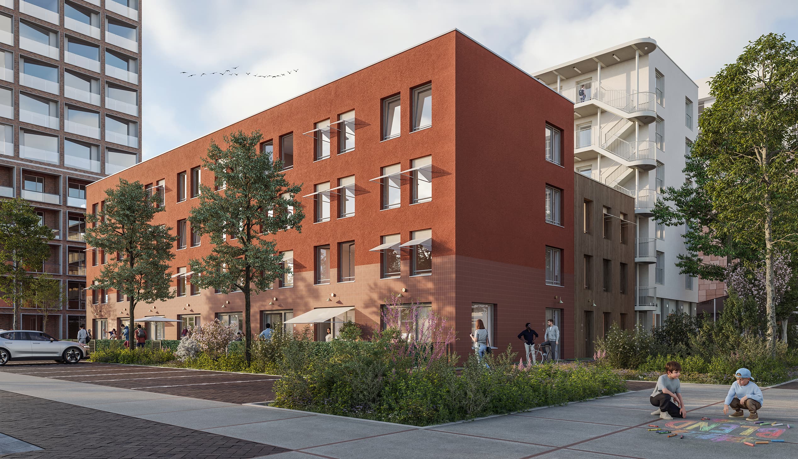 Impressie van de stadswoningen van Blend: rode bakstenen gevel met groene voortuinen